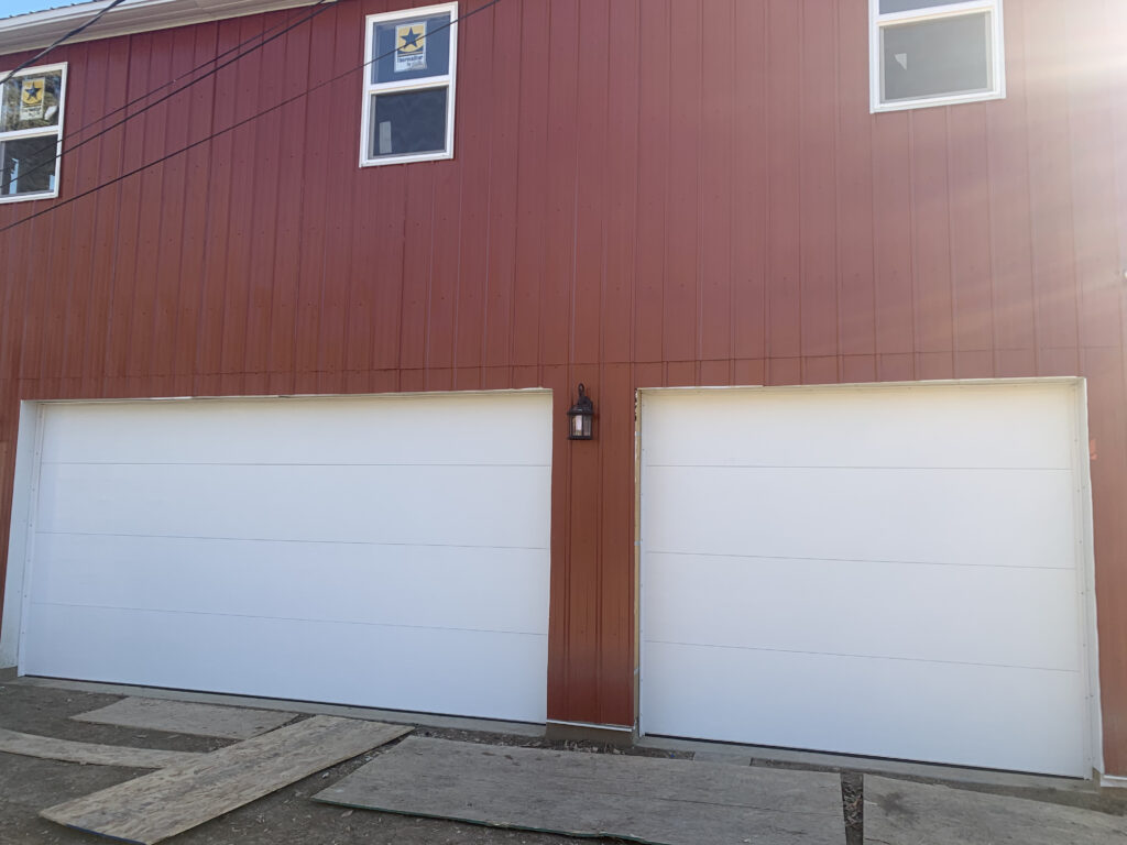 White flush panel garage doors