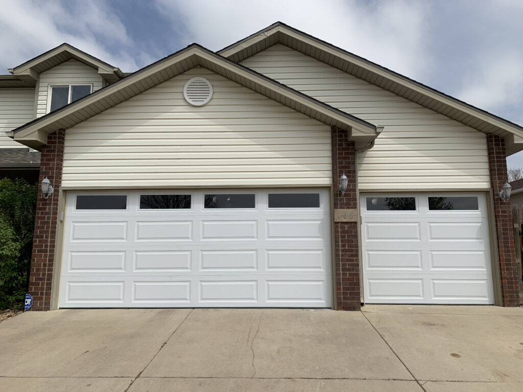 2 standard traditional white garage doors